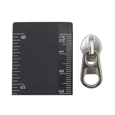 Бегунок для спиральной молнии Т 7 галант. Реверсивный (KKY) цв.Никель (уп.500шт)2