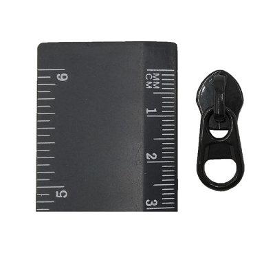 Бегунок для спиральной молнии Т 7 галант. Реверсивный (KKY) кач. А  цв.322 Черный (лак.) (уп.500шт)1