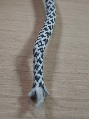  Шнур светоотражающий круглый с наполнит.; ПЭ+светоотр.нить, 5мм, 5,5г/м (нам. 100 м) цв.602 белый  ТриКатушки