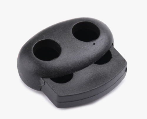  Фиксатор для шнура 2 отверстия Овал 103-М (27002-СМ) цв.Черный (уп.50/250/1000 шт)  ТриКатушки