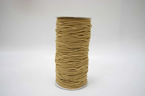  Резинка шляпная 2,5 мм №292 бежевый (рул.100 м)  ТриКатушки